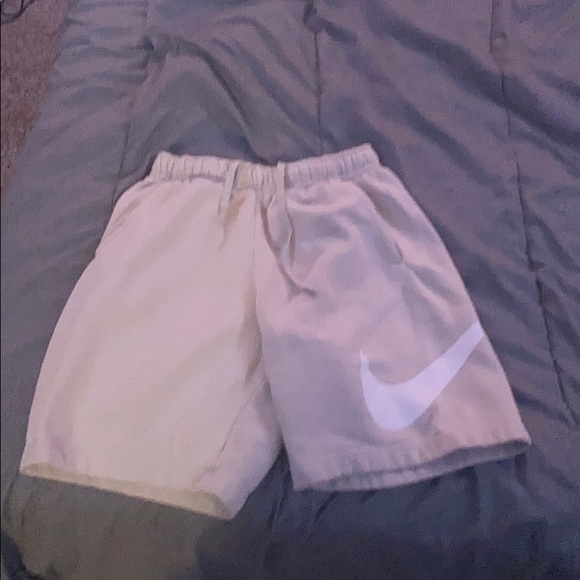 beige nike shorts